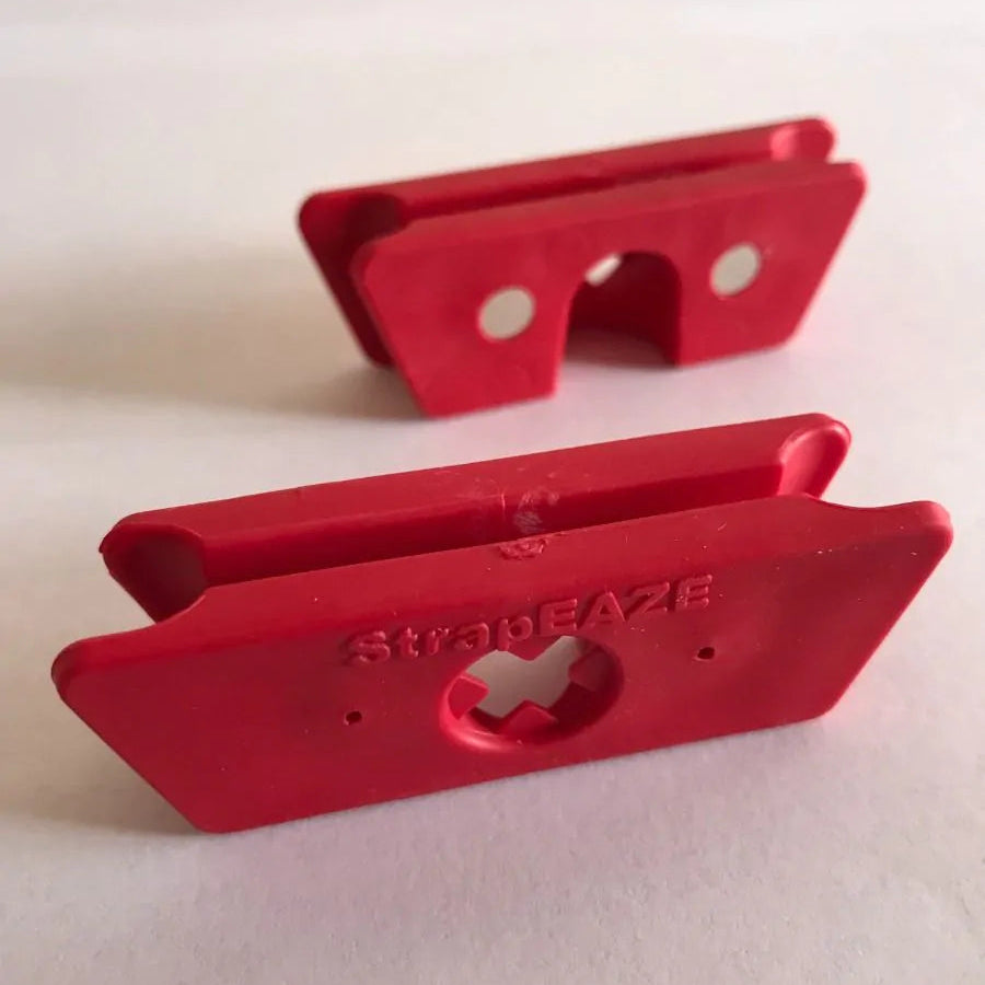 StrapEaze red rubber device with a built-in neodymium magnet